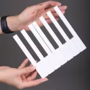 Накладки Yamaha без фронта, белые, глянцевые, 51 мм, проложены калькой, обернуты картоном