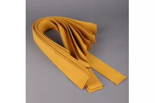 Кожа прессованная (кожевенная стружка) 640×48×2 мм, жёлтая — заготовка для фенгеров, барабанчиков - 1 полоса